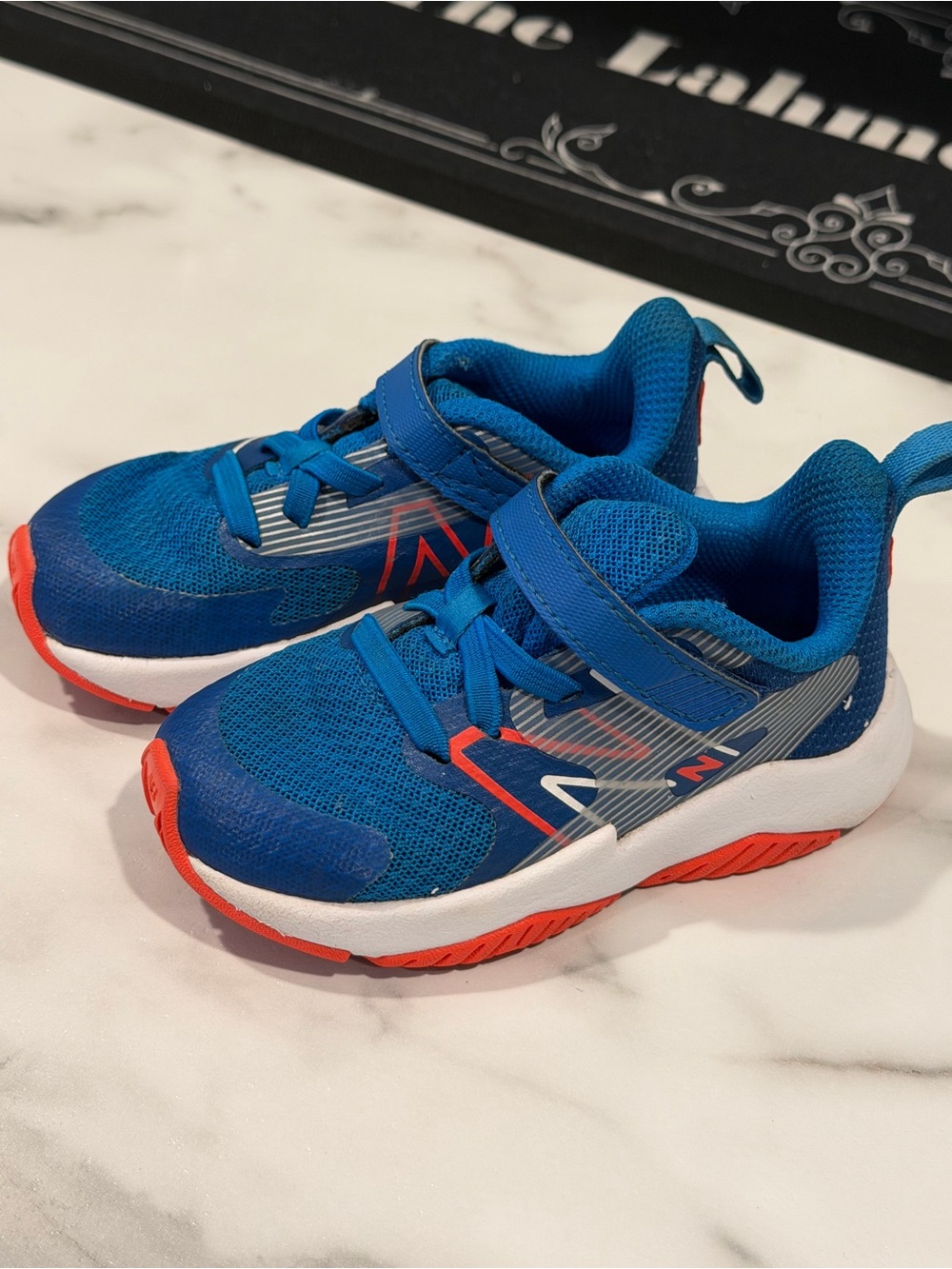 New Balance Kids Blue and Orange Athletic Sneakers